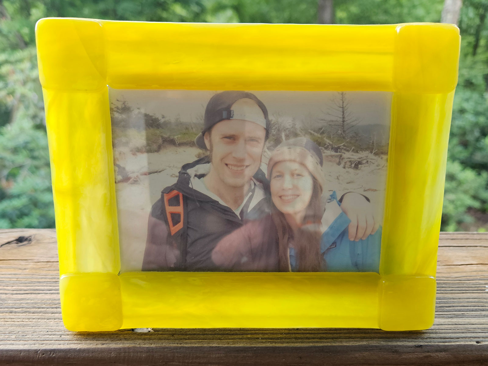 Yellow glass frame is created using tack fusing
